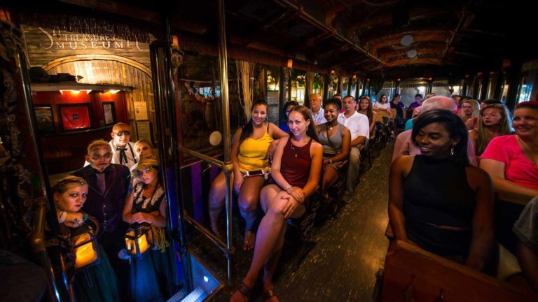 key west ghost trolley interior with guests