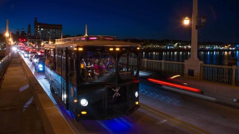 st augustine ghost trolley on bridge of lions