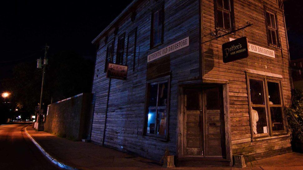 entrance to potters wax museum at night