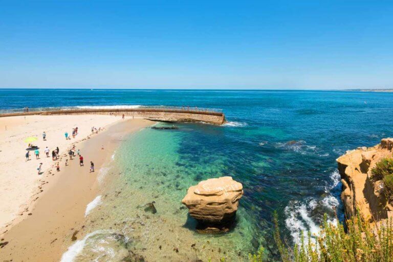 la jolla cove aerial view with tourists on the sand