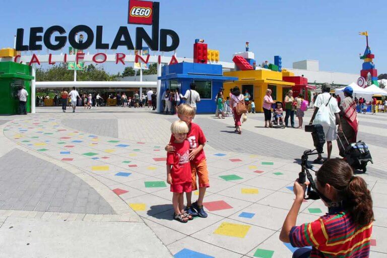 young children at legoland san diego entrance