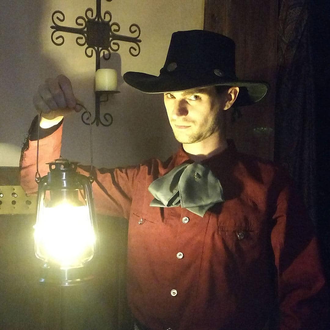 San Diego ghost host El Charro holding a lantern