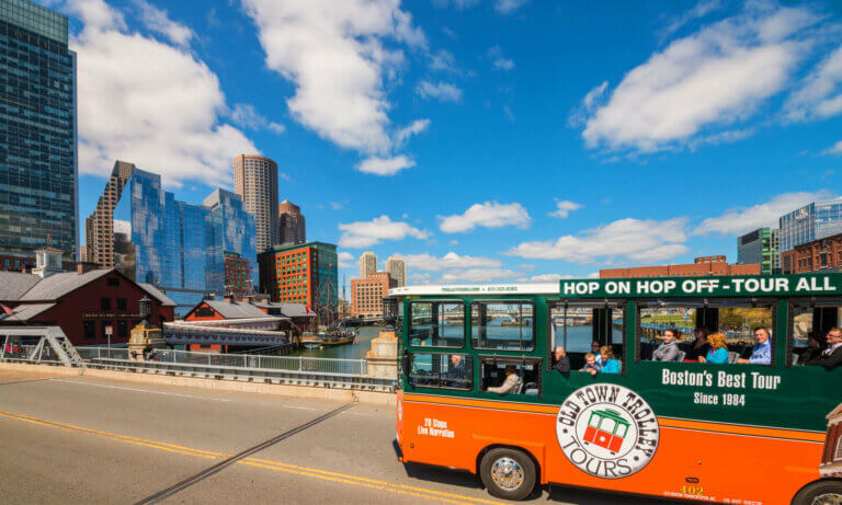 Boston trolley going over congress street bridge