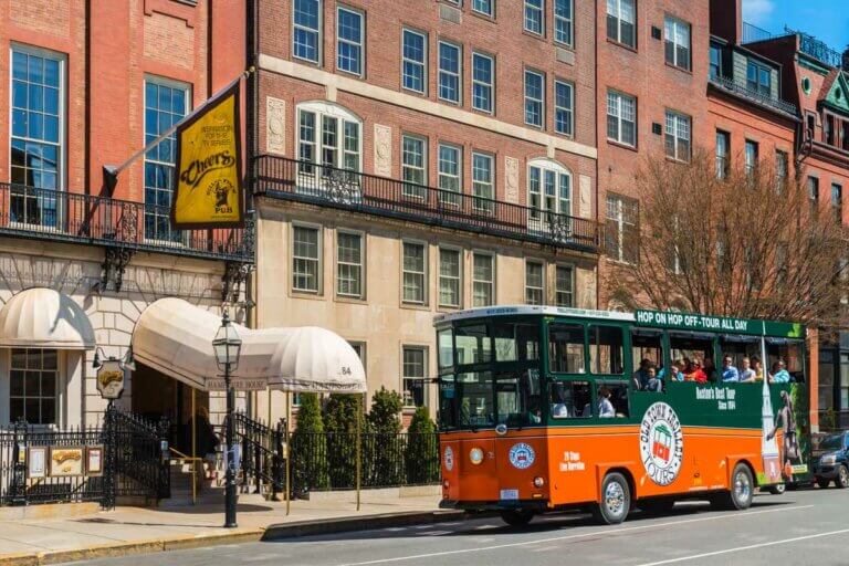 Boston trolley in front of Cheers restaurant