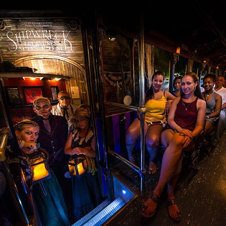 Key West ghost tour trolley and guests