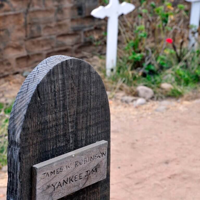 El Campo Santo Cemetery showcases historic gravestones surrounded by vibrant plants