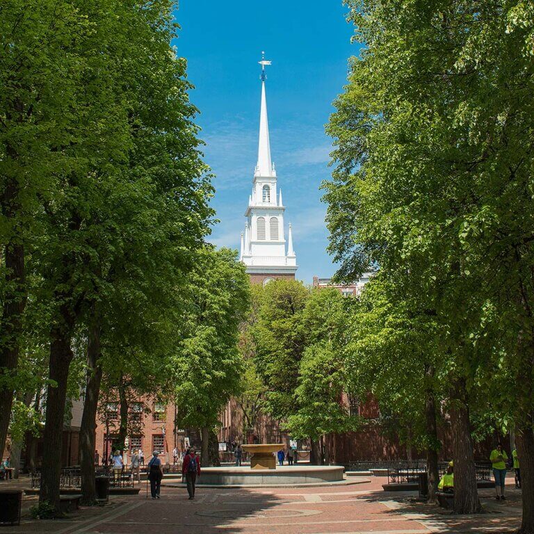 A historic church with a tall steeple, located in Boston, Massachusetts